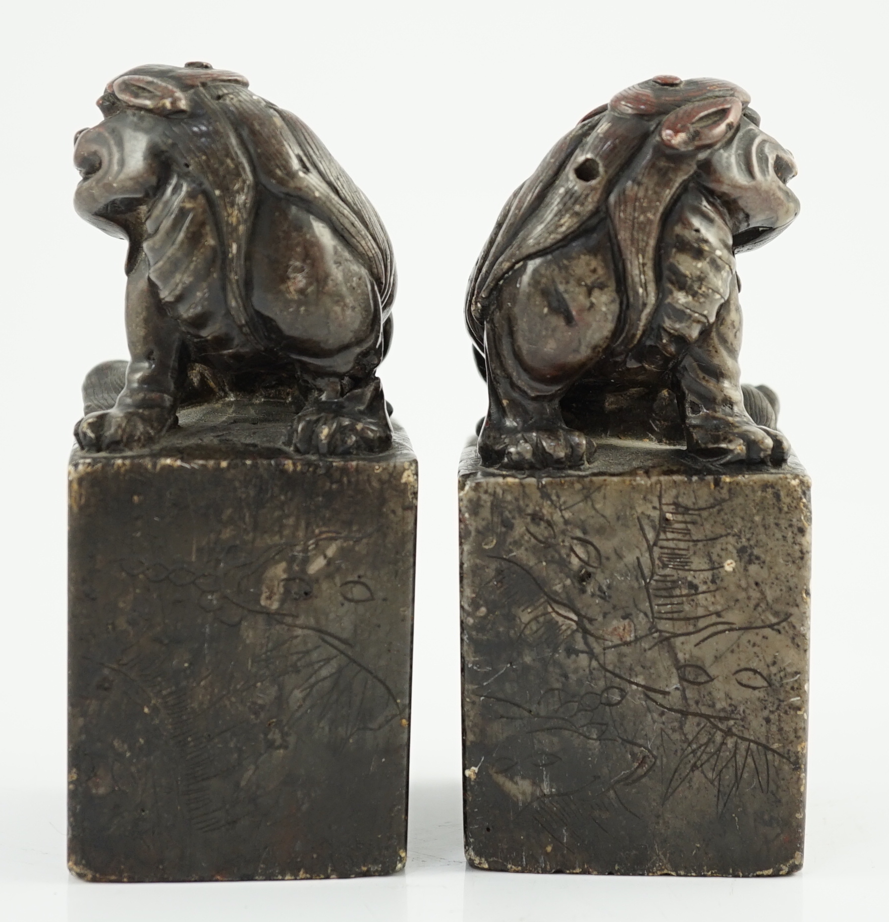 A pair of Chinese soapstone lion-dog seals, Qing dynasty